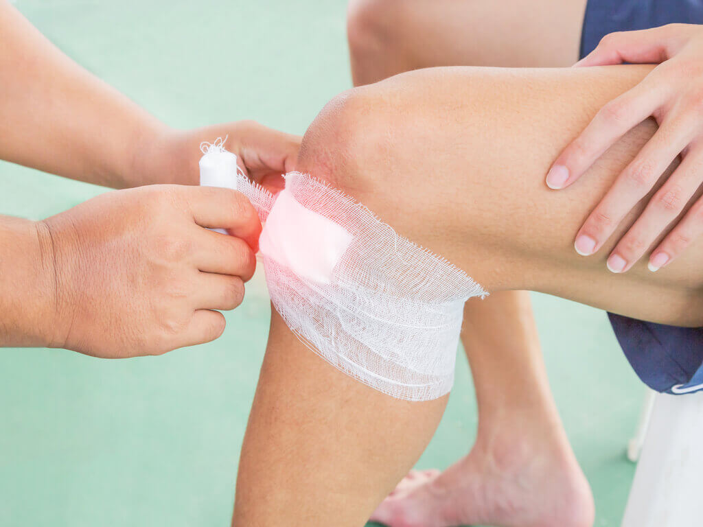 Wrapping Wound With Bandage