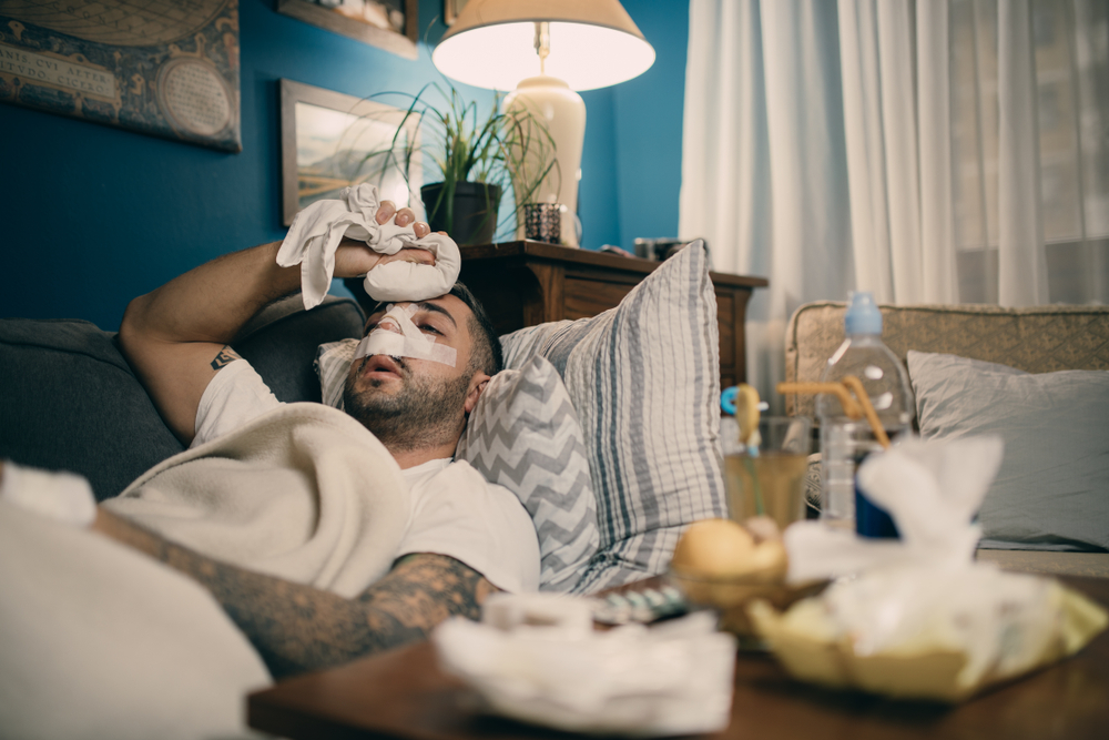 A man sick in bed healing.