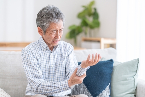 /elderly-man-arm-pain